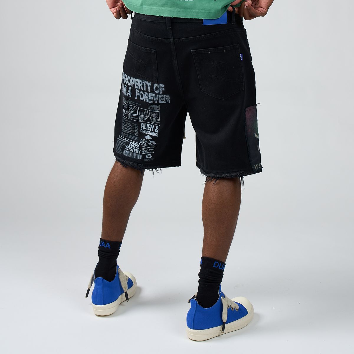 Men’s black shorts with side graphic print and frayed hem