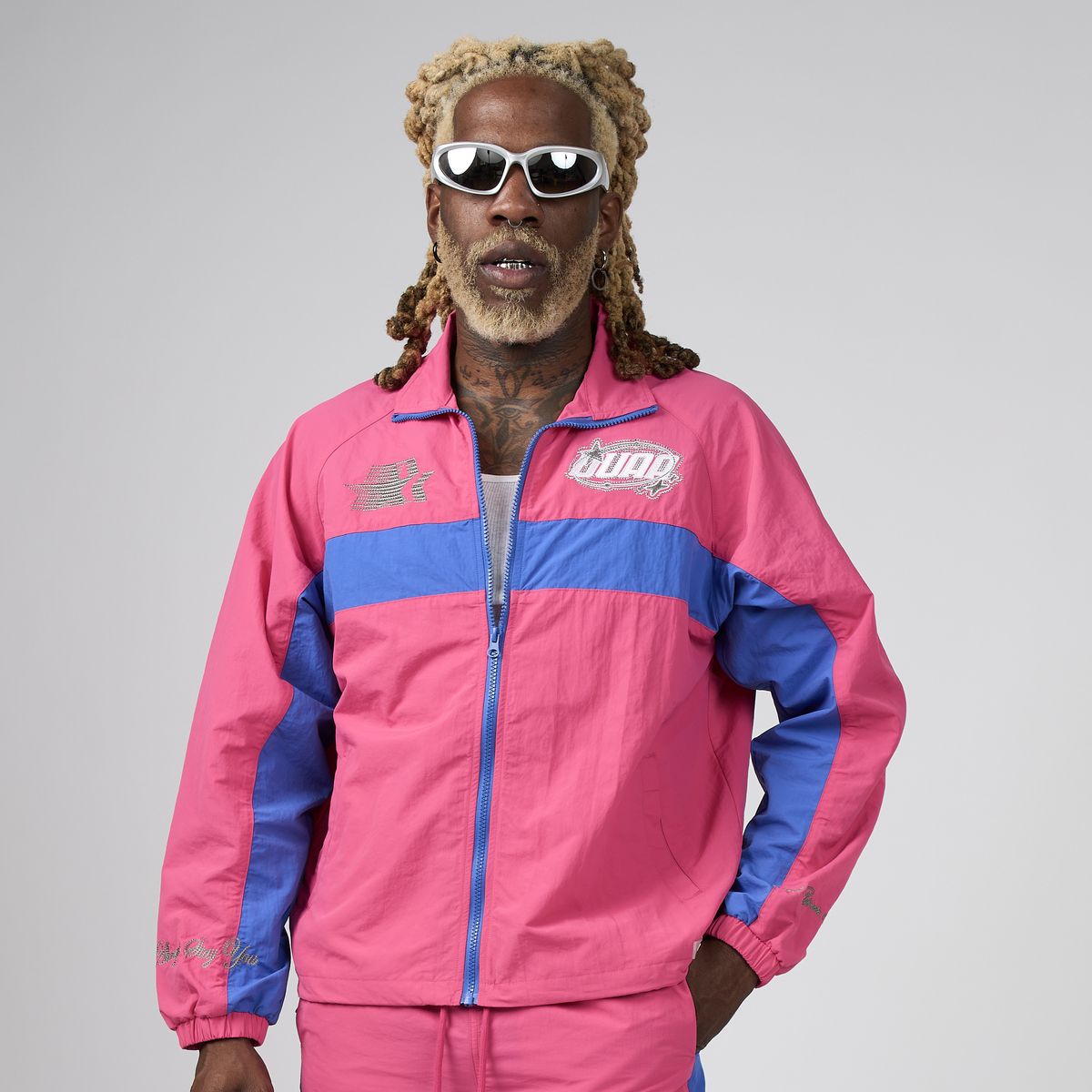 Men's pink and blue colorblock zip-up jacket with chest logo and front pockets