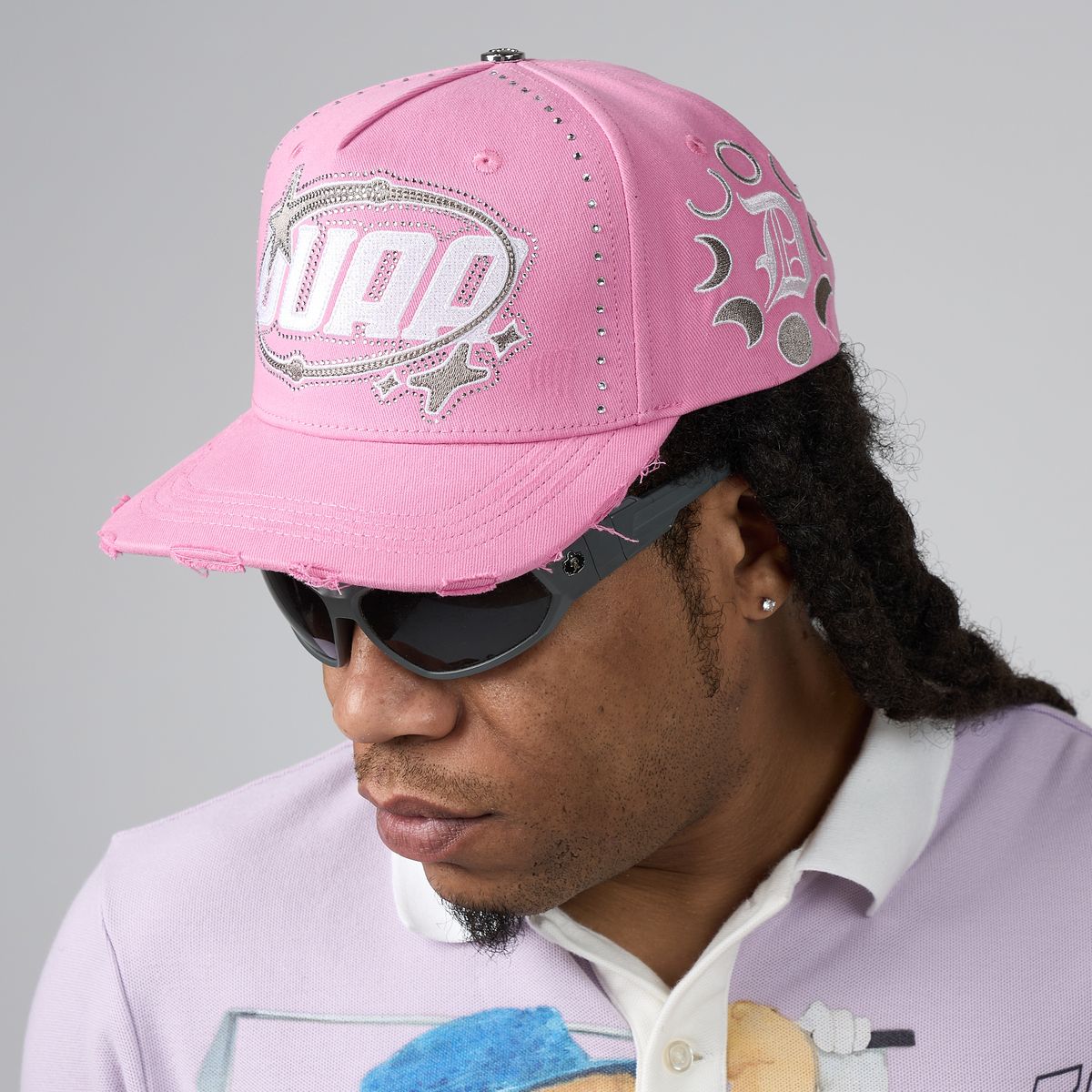 Men's pink DUAA baseball cap with front stitched logo and eyelet detailing