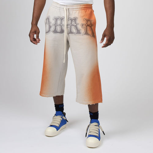 Men's stone capri jeans, two-tone orange/gray with drawstring waist and bold graphic