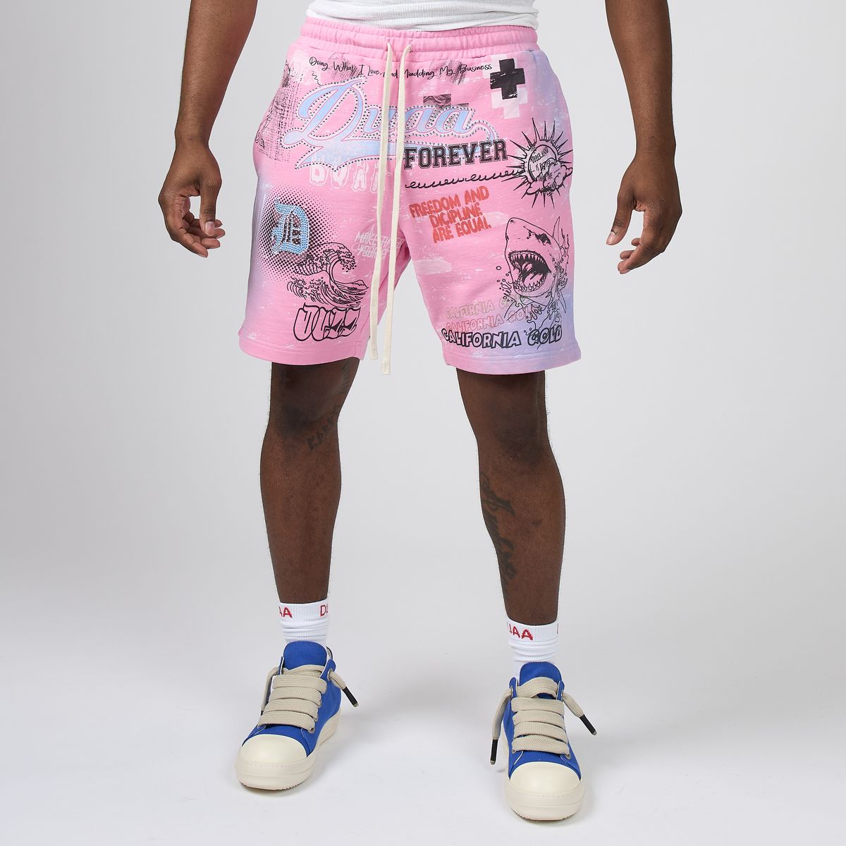 Men's pink graphic cloud shorts with drawstring waist and elastic hem