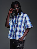 Men's blue plaid short-sleeve button-up shirt with chest pockets