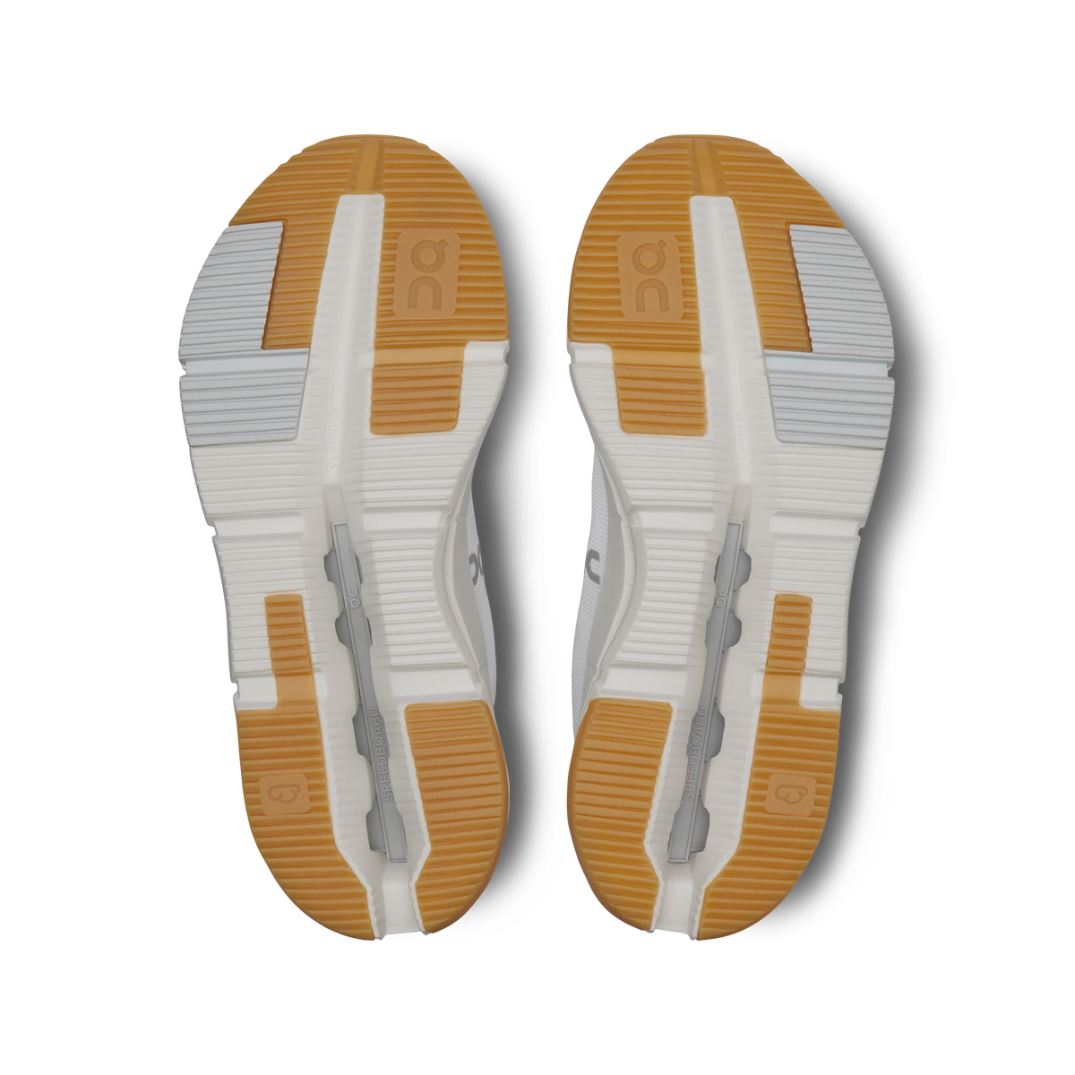 Pair of white/ivory shoe outsoles with orange traction pods and On logo