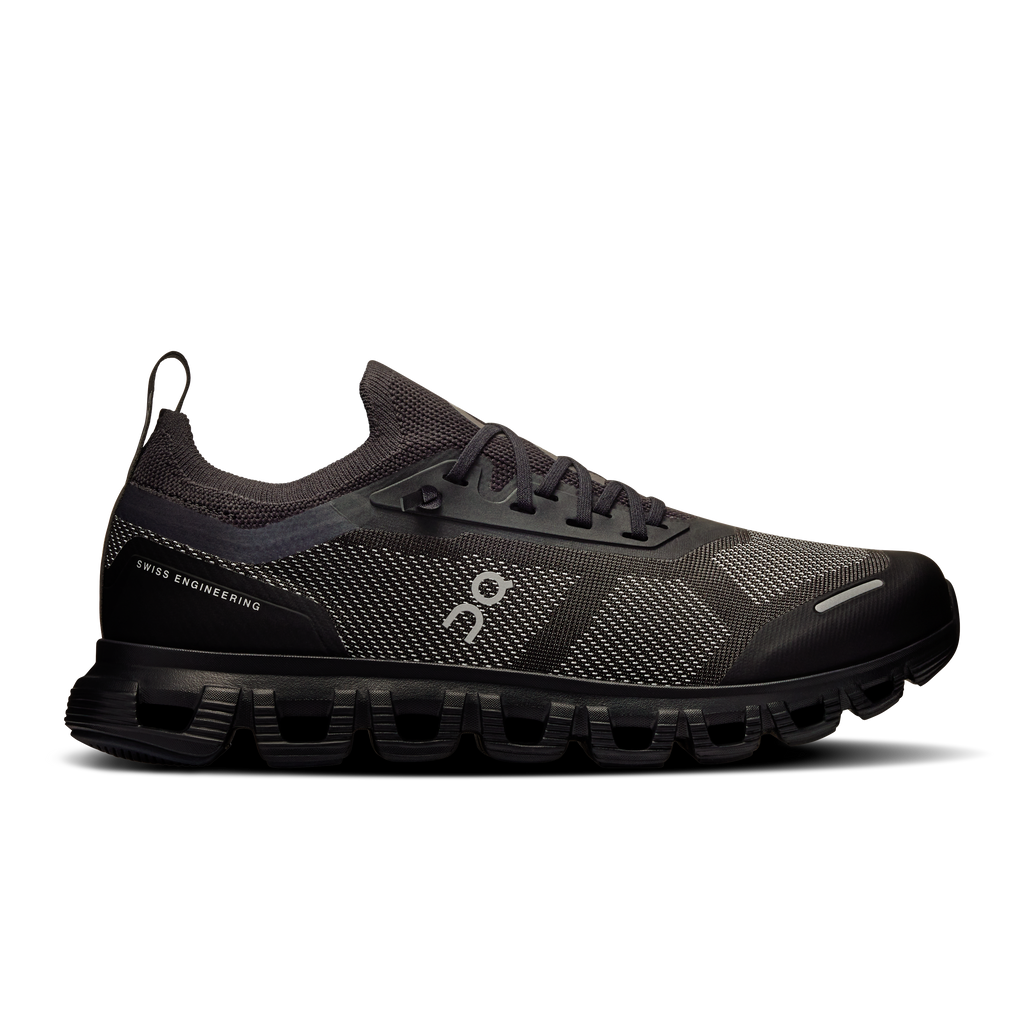 Women\u2019s black running shoes with mesh upper, lace-up and cushioned sole