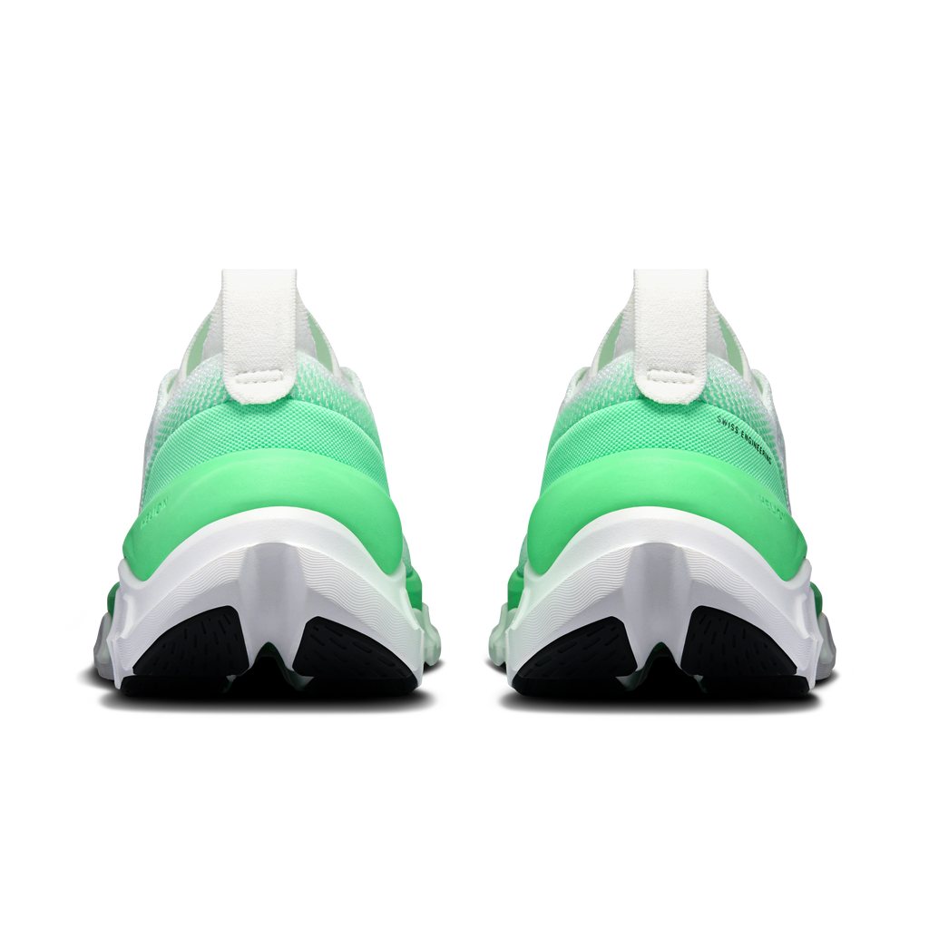 Men's running shoes heel view: green upper, ivory padding, cushioned white sole