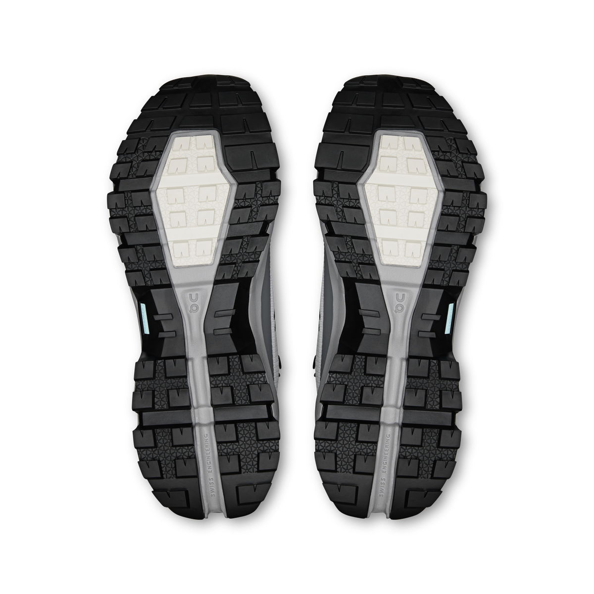 Waterproof mid hiking shoe outsoles, rugged black tread with light gray inserts