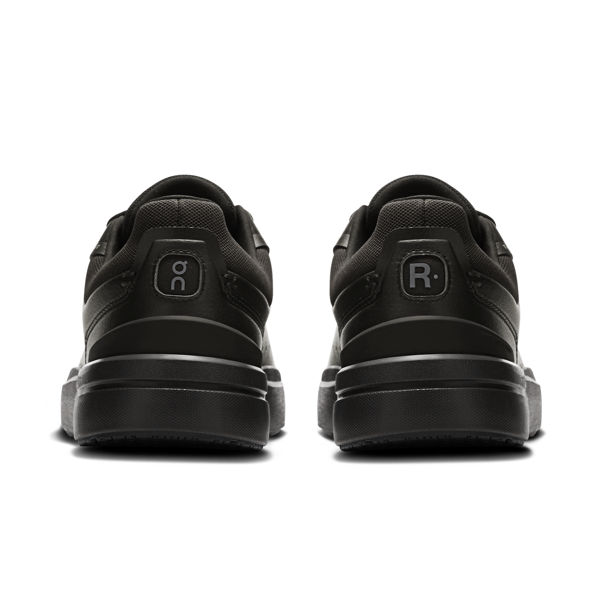 Black back view sneakers with On and R logo on heel