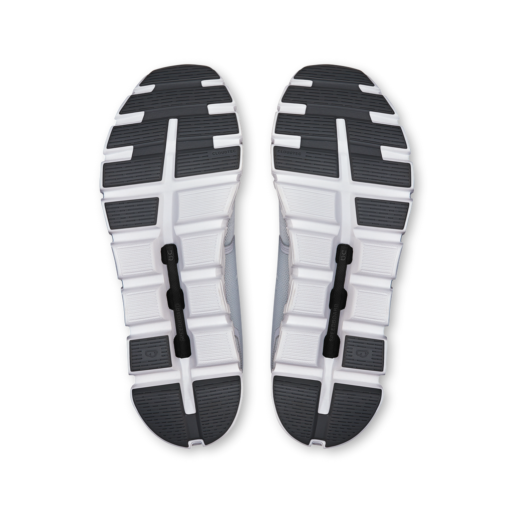 Shoe outsoles with white rubber tread and black traction pods