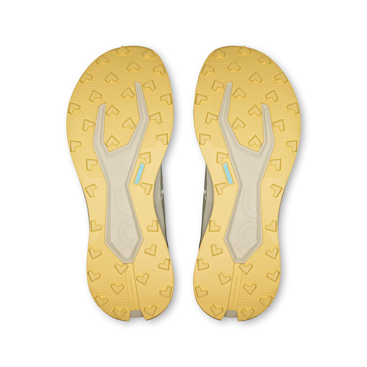 Pair of shoe outsoles with patterned tread and light gum rubber