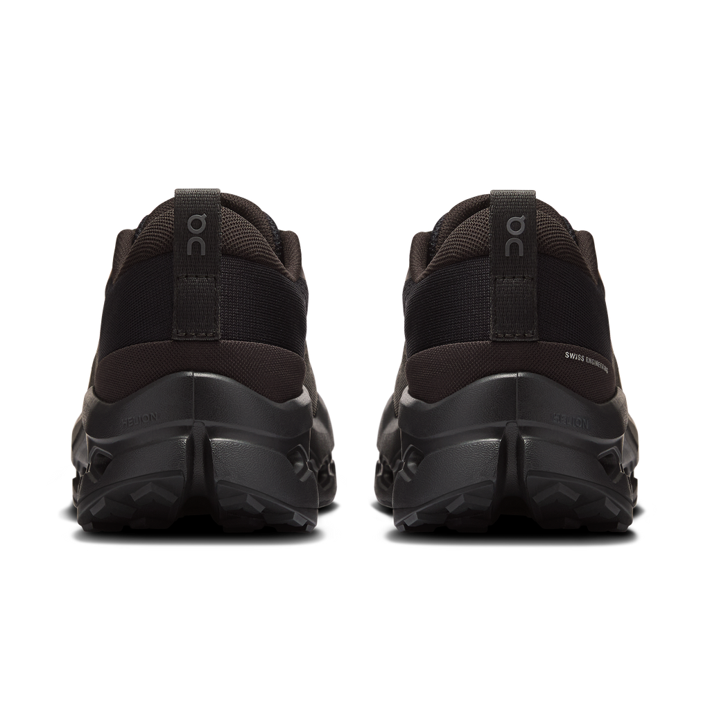 Women’s black trail running shoes, rear view with padded collar and durable outsole tread