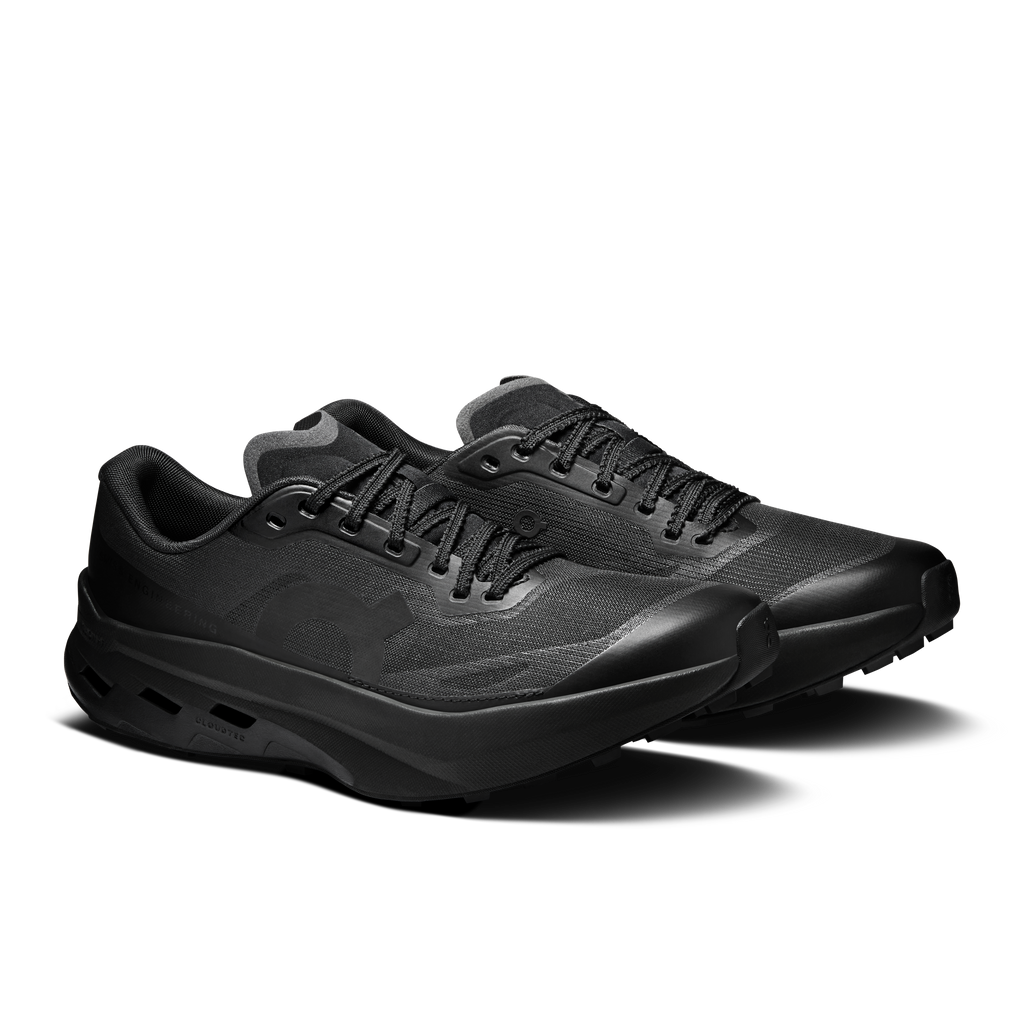 Women's black running shoes, lace-up with textured upper and sculpted midsole