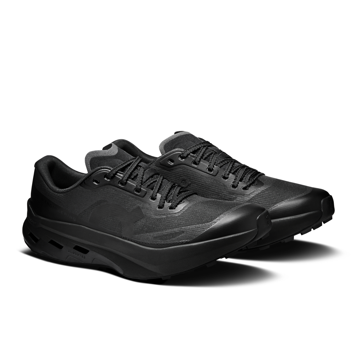 Women's black running shoes, lace-up with textured upper and sculpted midsole
