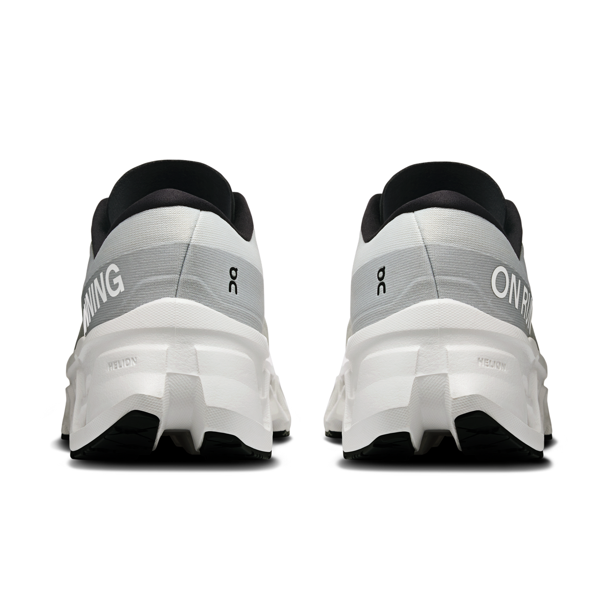 Women's white running shoes, heel view, black collar lining and cushioned heel