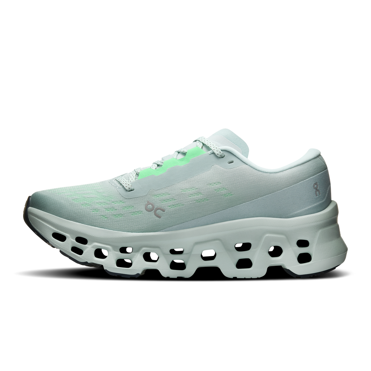 Women's running shoes, side view: light gray knit upper with mint lace tabs