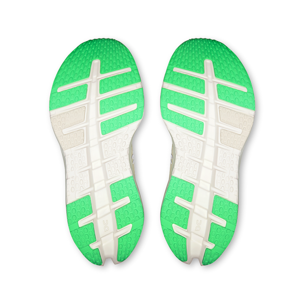 Shoe outsoles pair, textured neon green rubber with white traction bars
