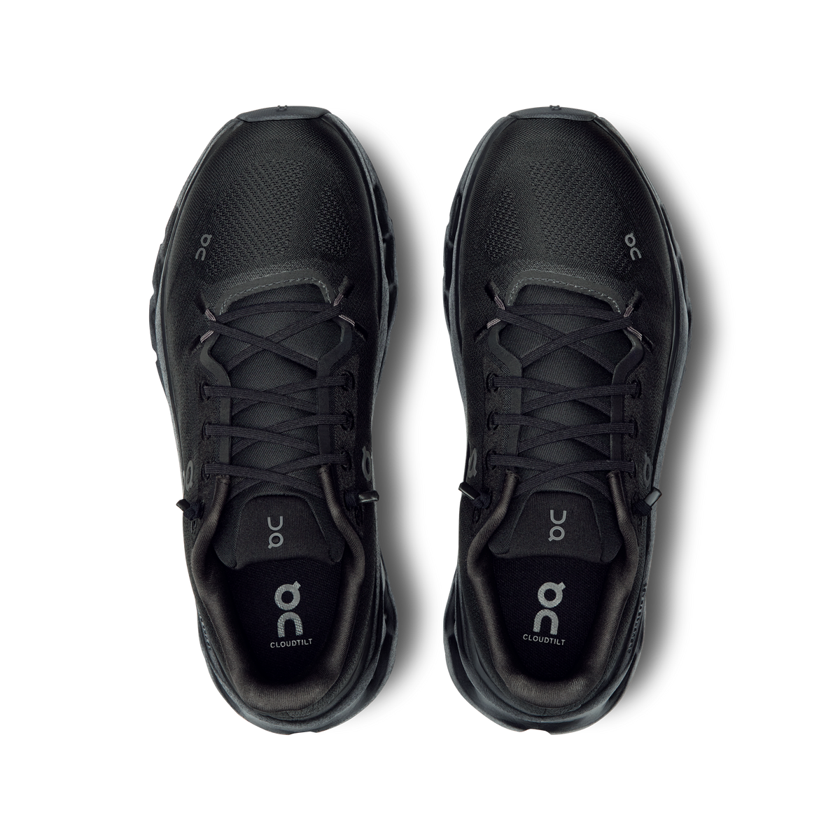 Pair of black women's running shoes, front view with lace-up design