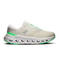 Women’s wide running shoes in off-white with neon green laces and trim, podded sole