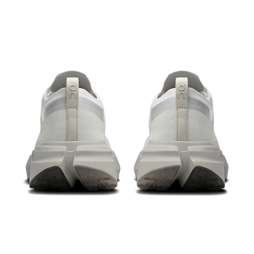 Women’s running shoes heel view, pearl knit with light-blue lining and cushioned white sole