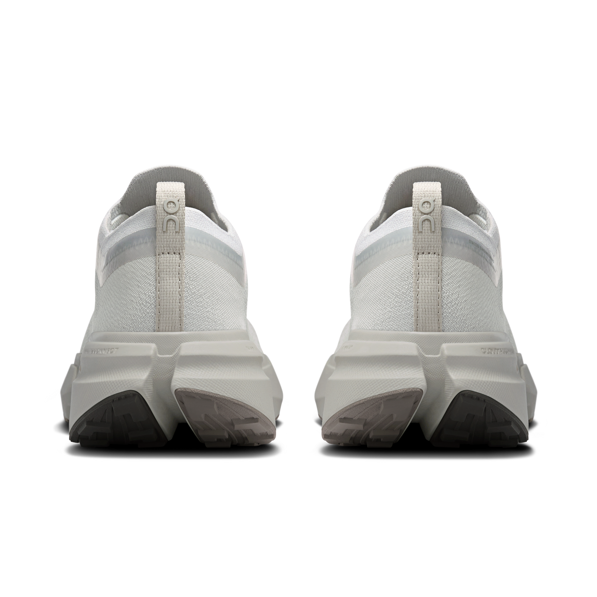 Women’s running shoes heel view, pearl knit with light-blue lining and cushioned white sole