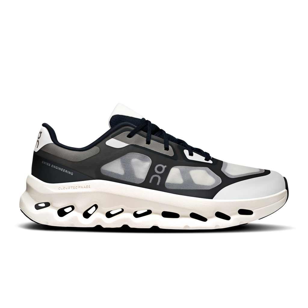 Men's black and ivory running shoes with Cloud-style cutout sole and lace-up upper