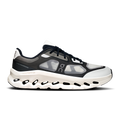 Men's black and ivory running shoes with Cloud-style cutout sole and lace-up upper