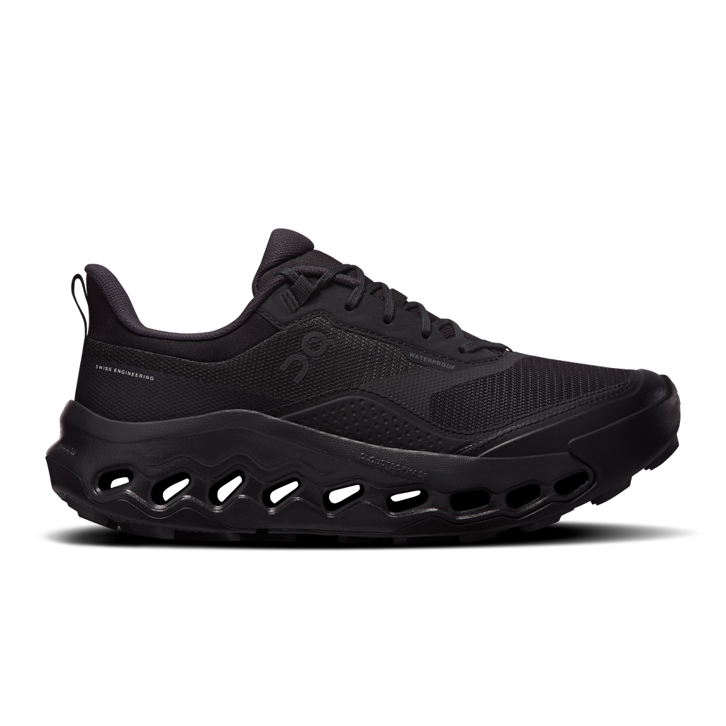Women's waterproof running shoes in black, lace-up mesh upper and cushioned sole