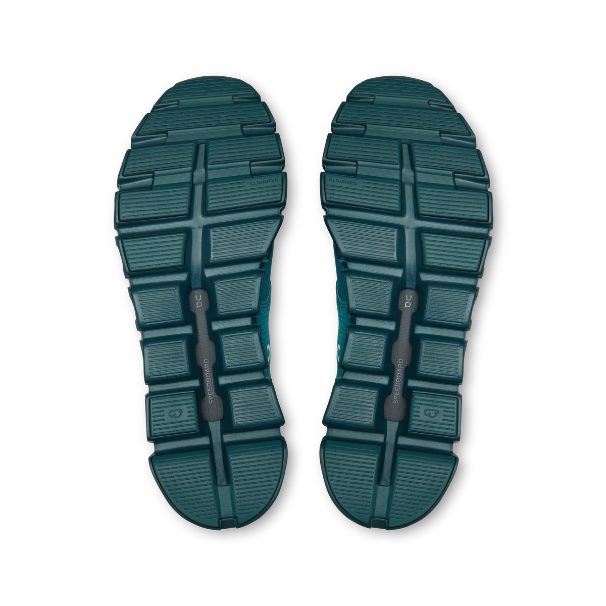 Pair of teal shoe outsoles with rugged tread pattern for traction