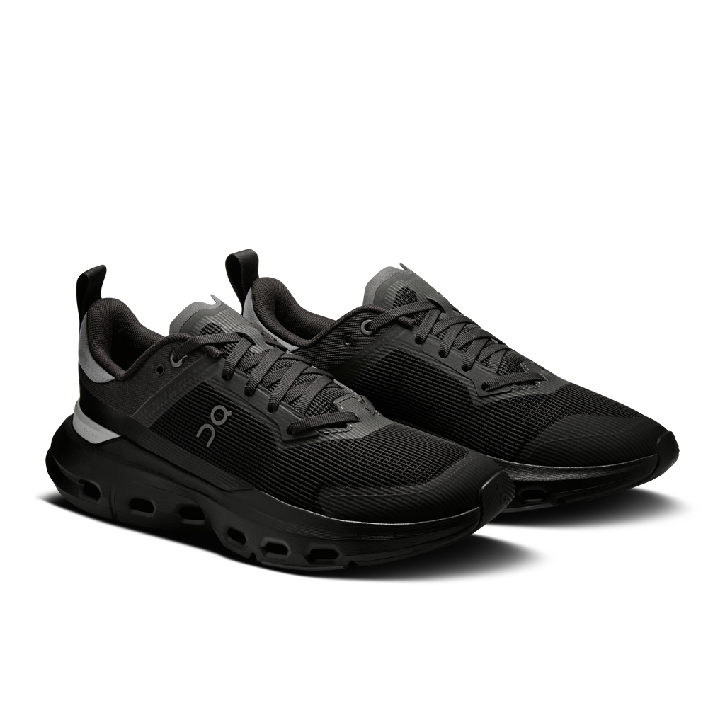 Pair of On women's Cloudpulse running shoes, black knit upper and CloudTec cushioning