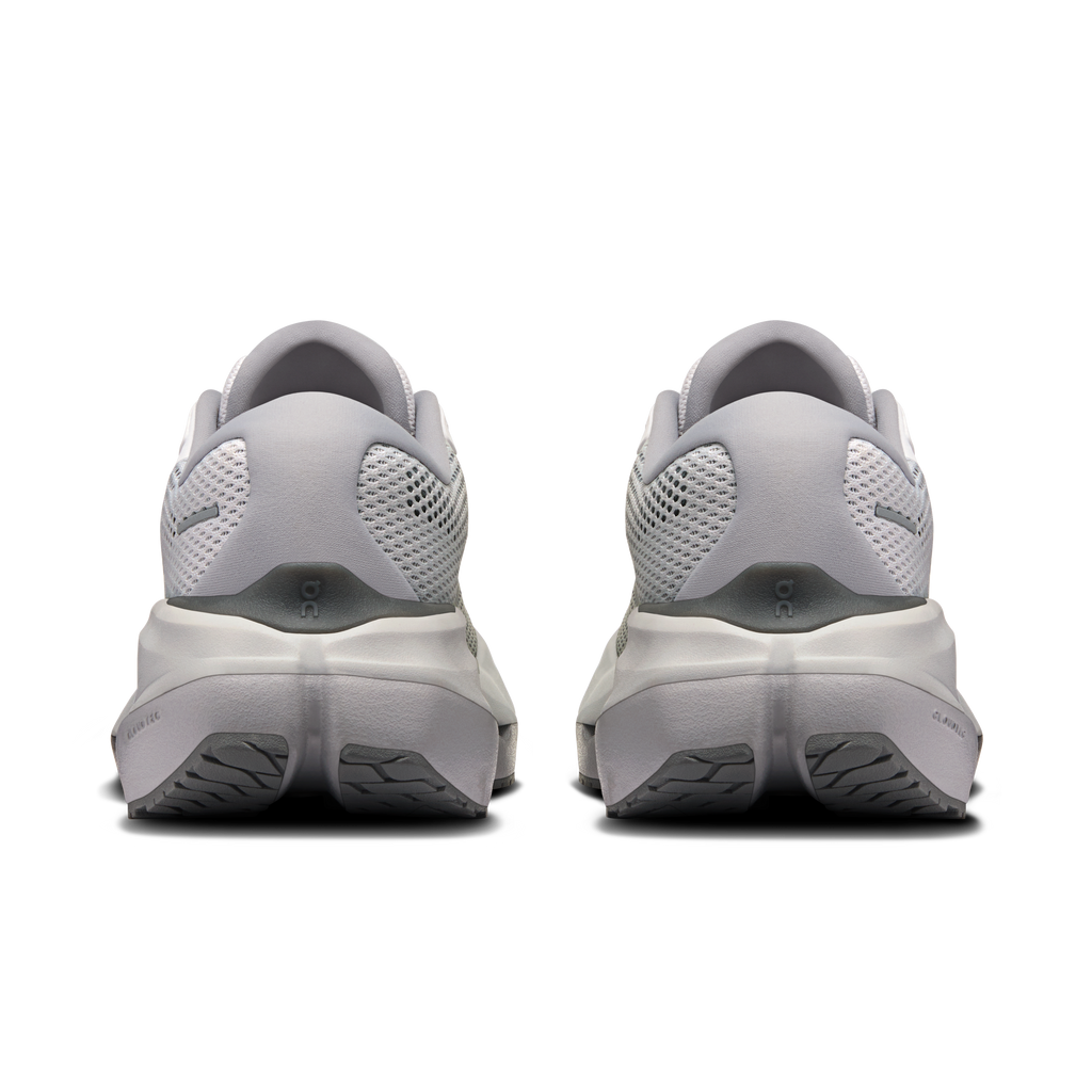 Men's running shoes heel view with padded collar and dark tread accents