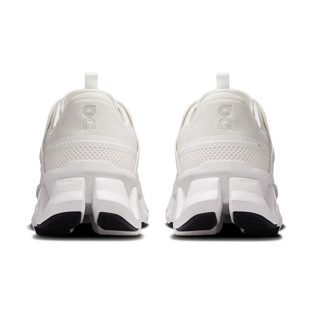 Men's white running shoes rear view with pull tab and CloudTec cushioning sole
