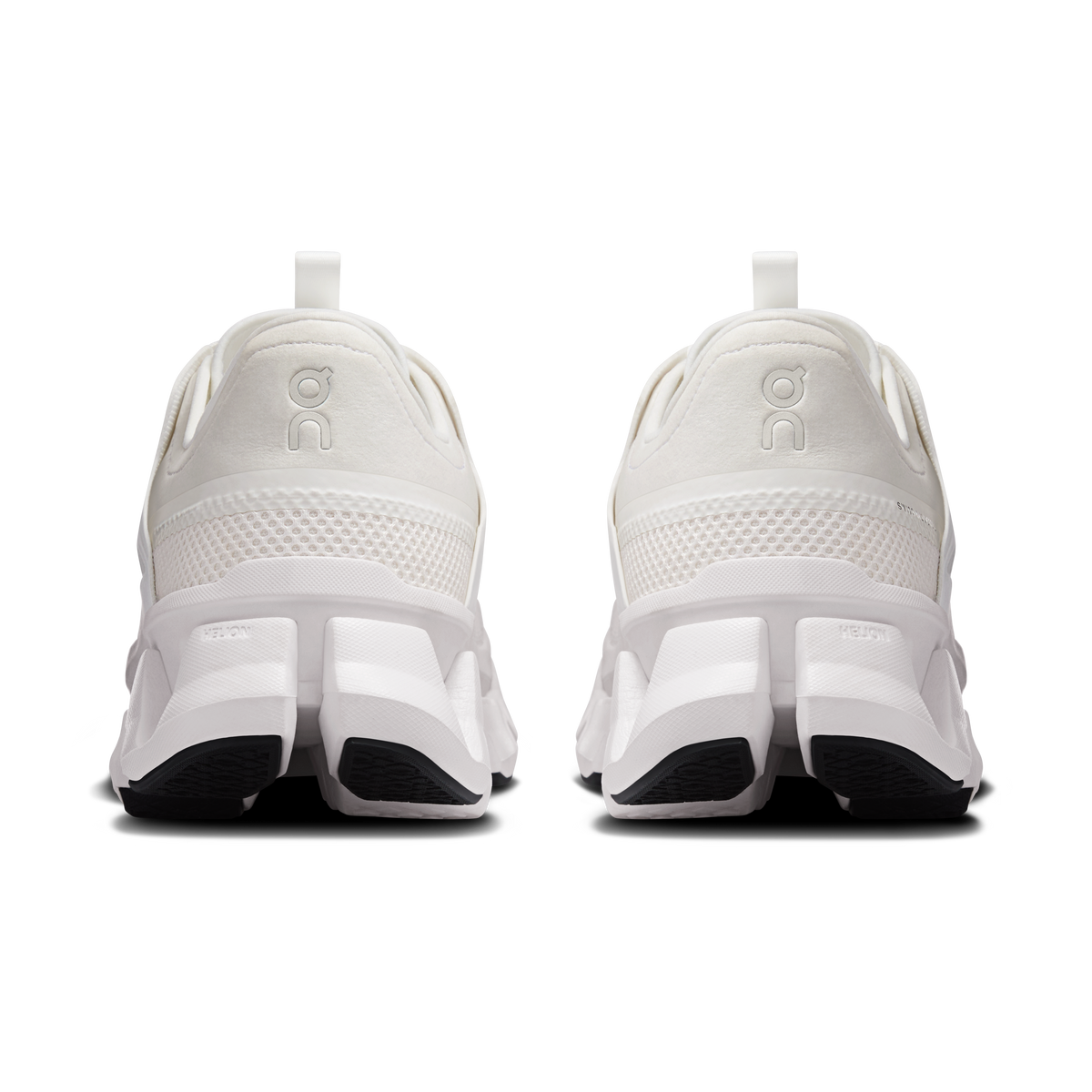 Men's white running shoes rear view with pull tab and CloudTec cushioning sole