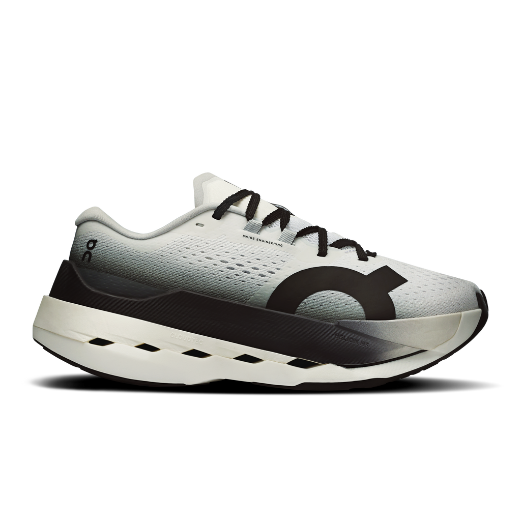 Women's On Cloudboom Max running shoes with white upper, black laces, and logo detail