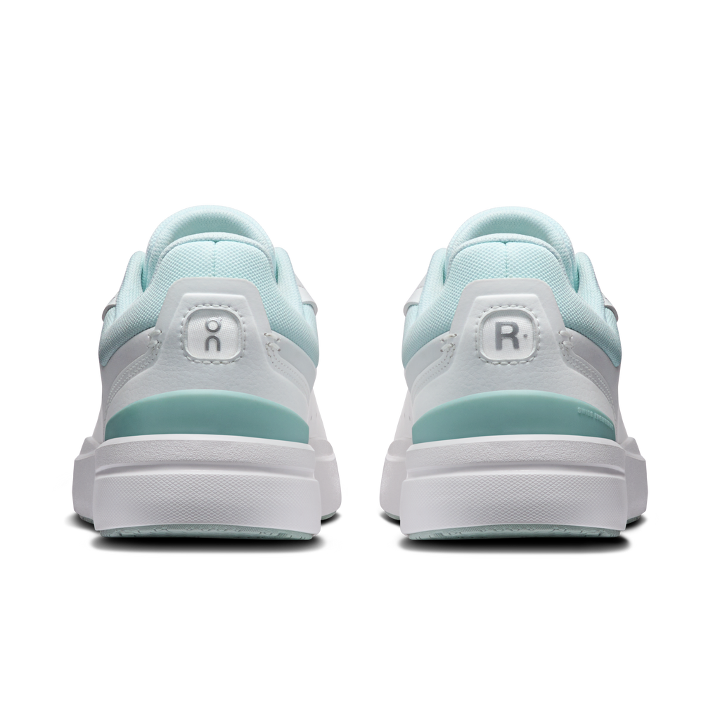 Women's back view white and light blue sneakers with heel tabs