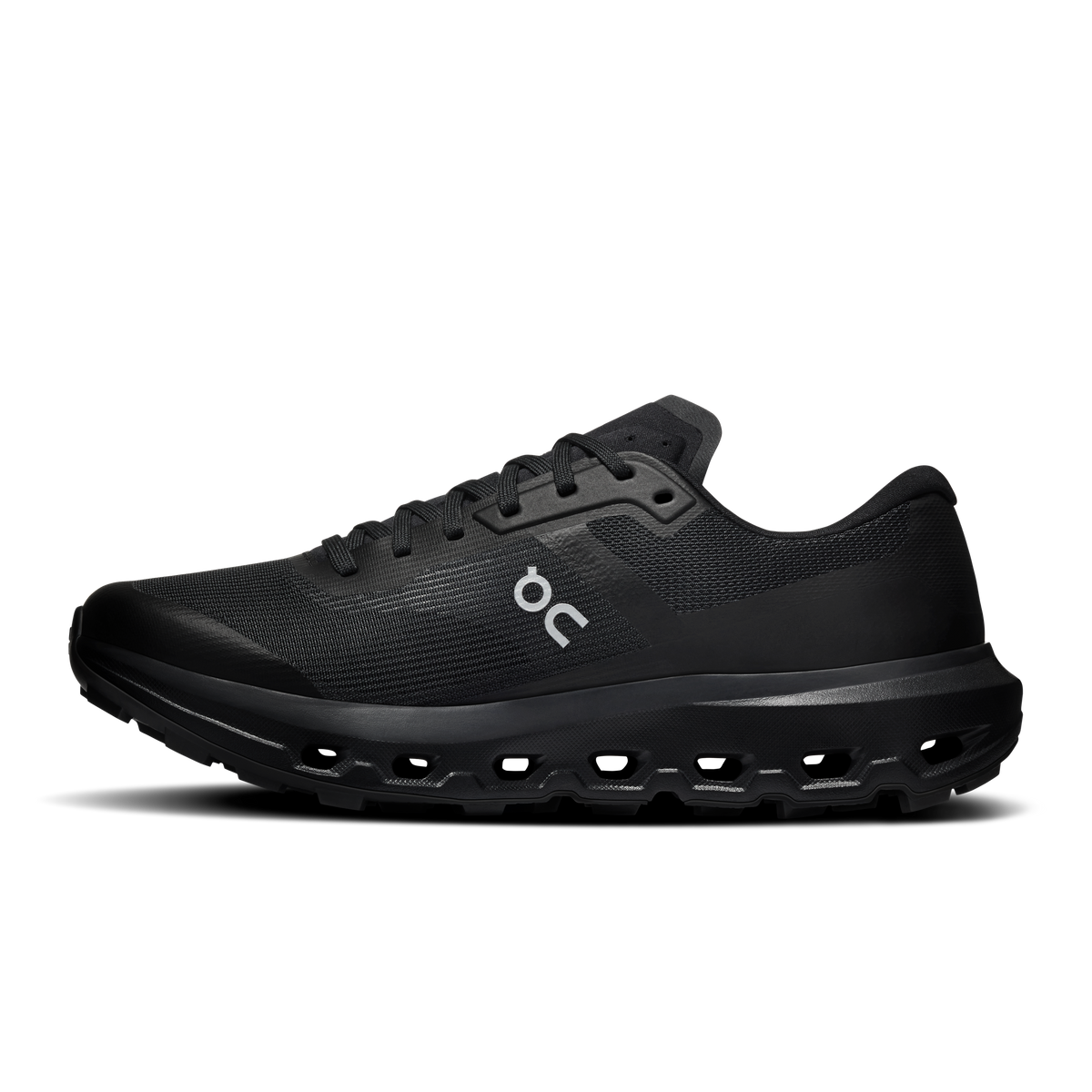 On Cloudvista 3 black running shoes, side view, lace-up mesh and rubber pods