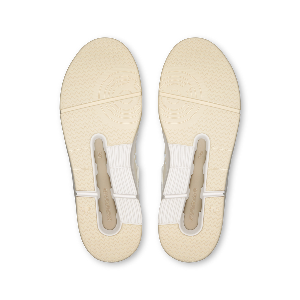 Men's sneaker outsoles with textured tread and light beige traction grooves