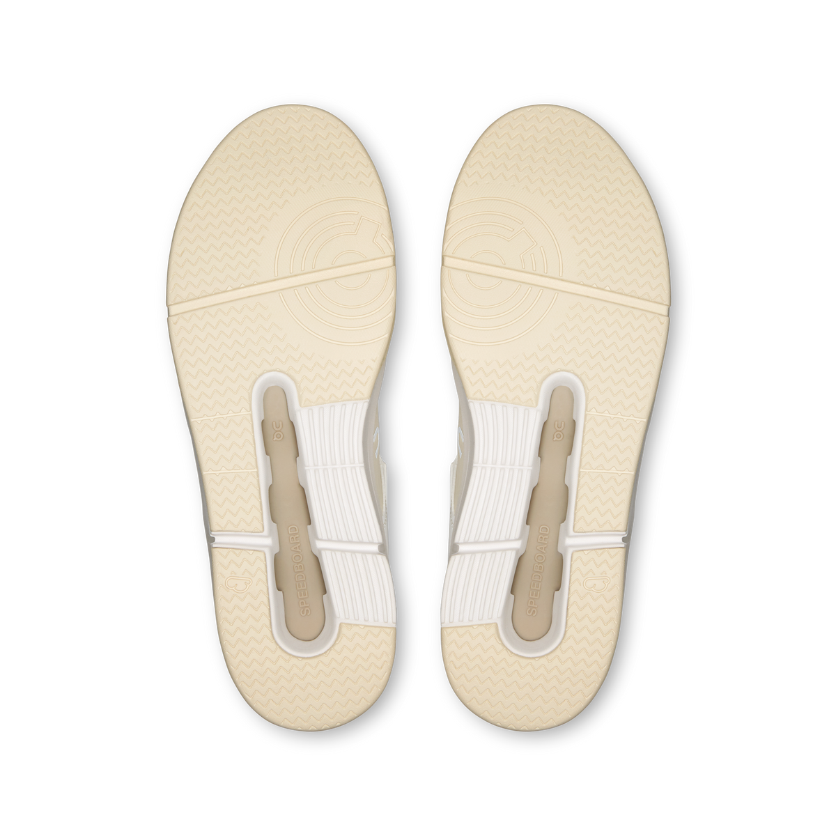Men's sneaker outsoles with textured tread and light beige traction grooves