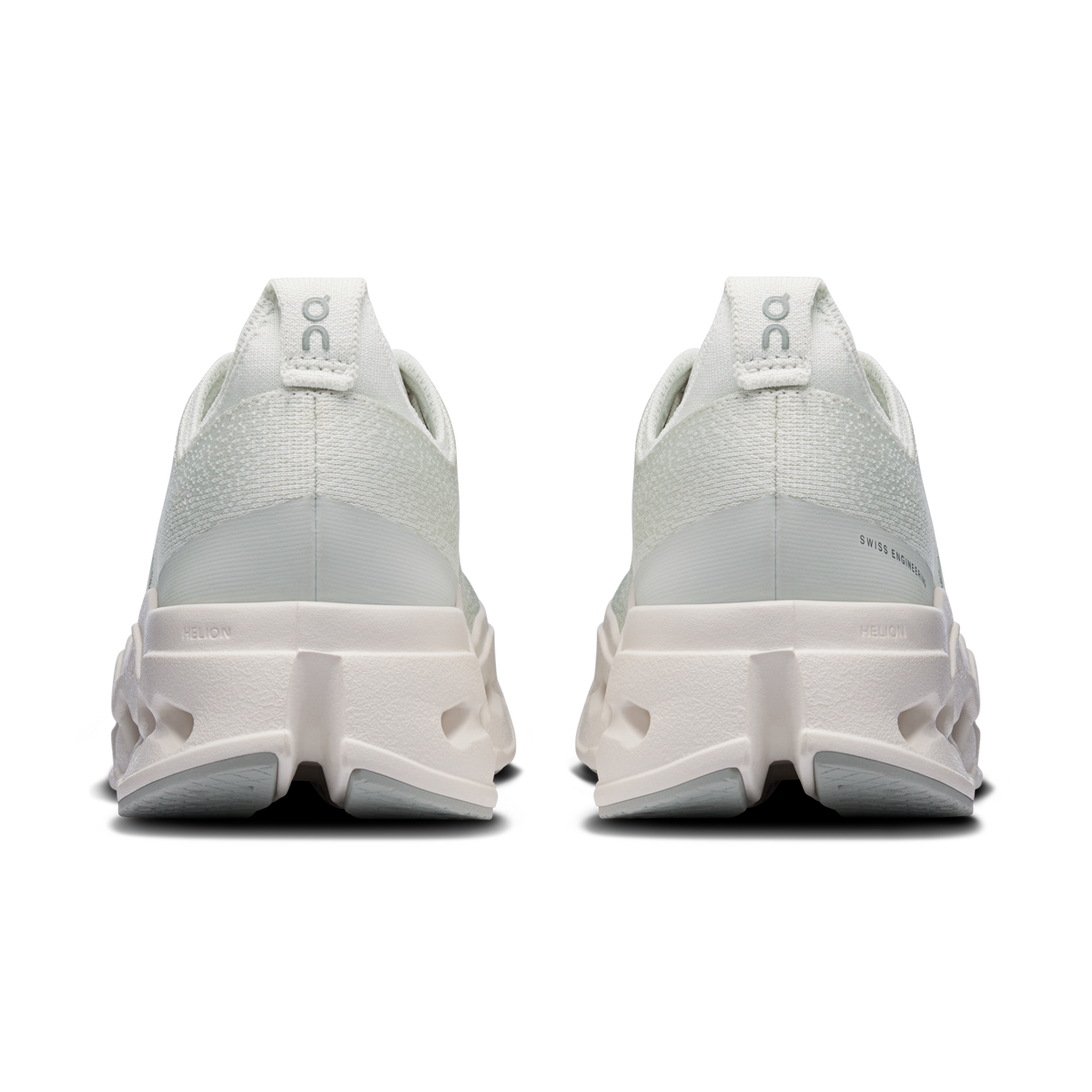 On women's running shoes, heel view with light mint upper and cushioned sole