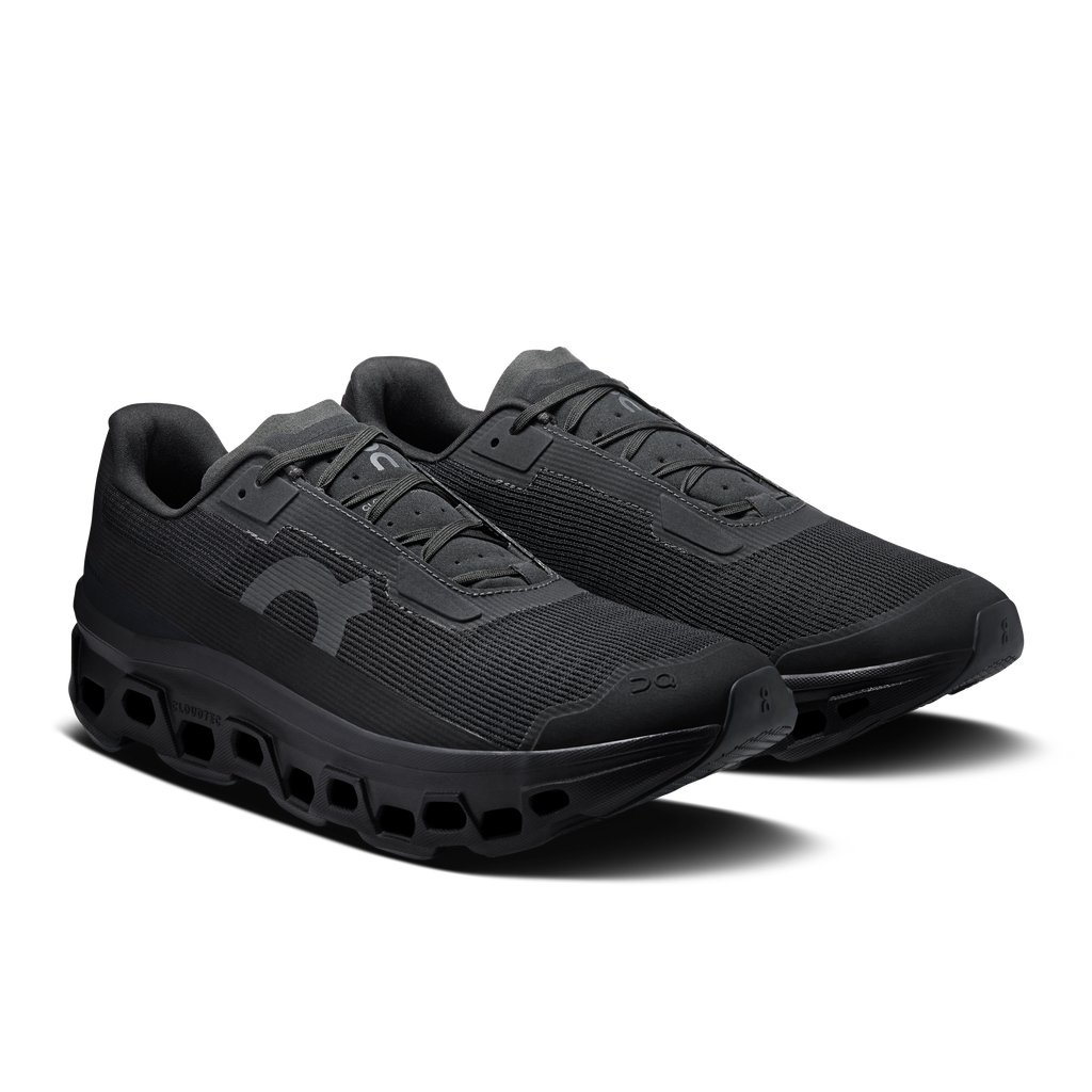 Men's black lace-up running shoes with textured upper and CloudTec sole