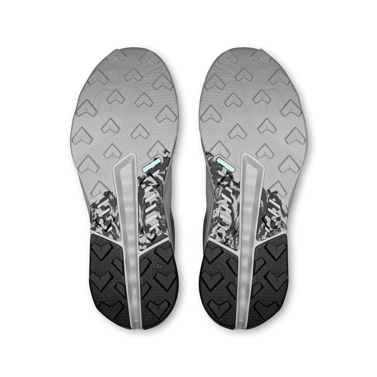 Men's waterproof running shoe outsoles, textured tread on gray rubber bottoms