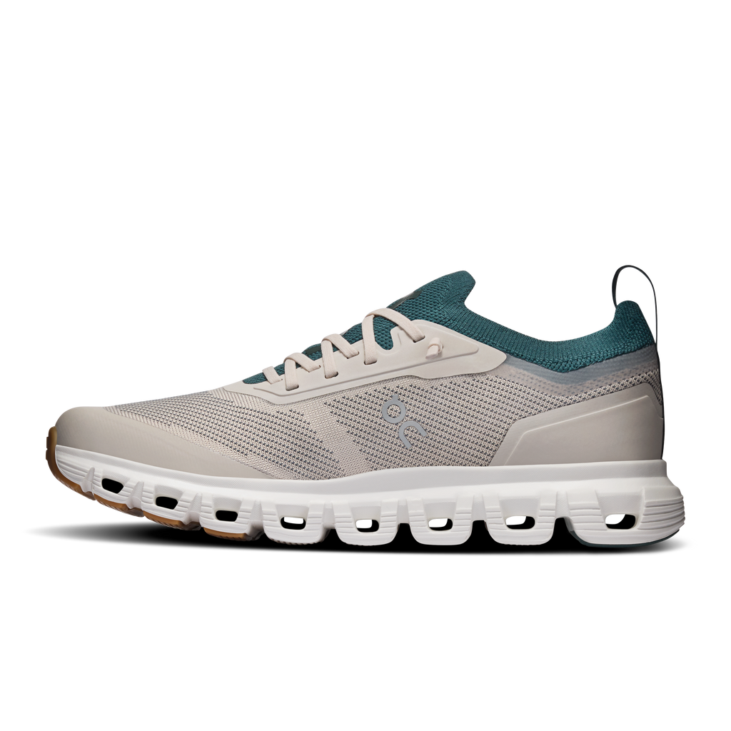Women's running shoe, pearl mesh with teal collar and logo, Cloud cushioning sole.