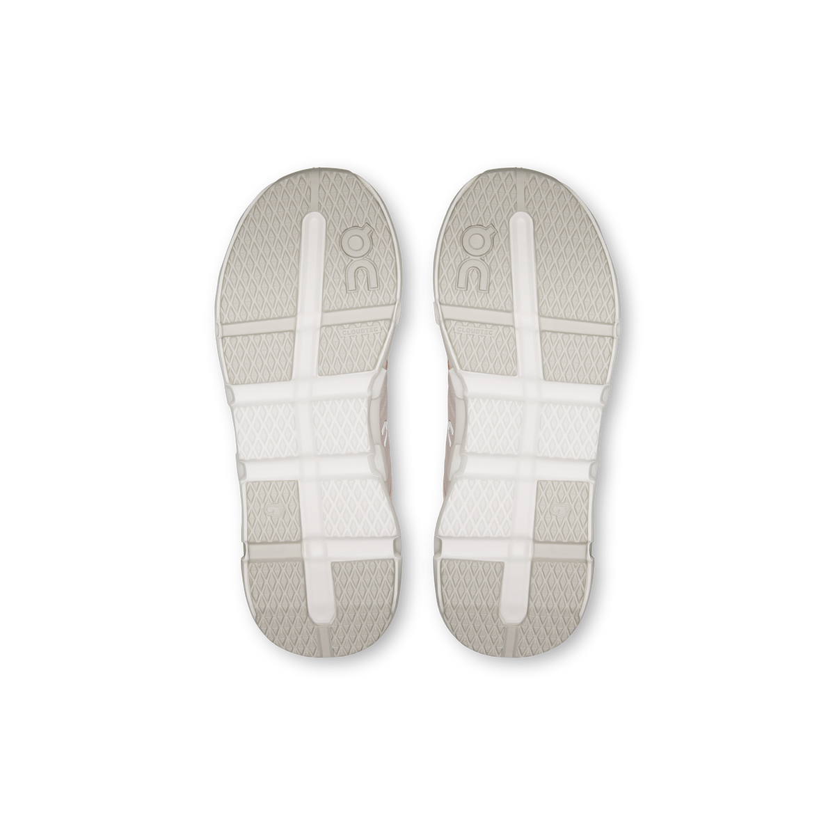 Pair of kids' running shoe outsoles, textured white tread with pale accents