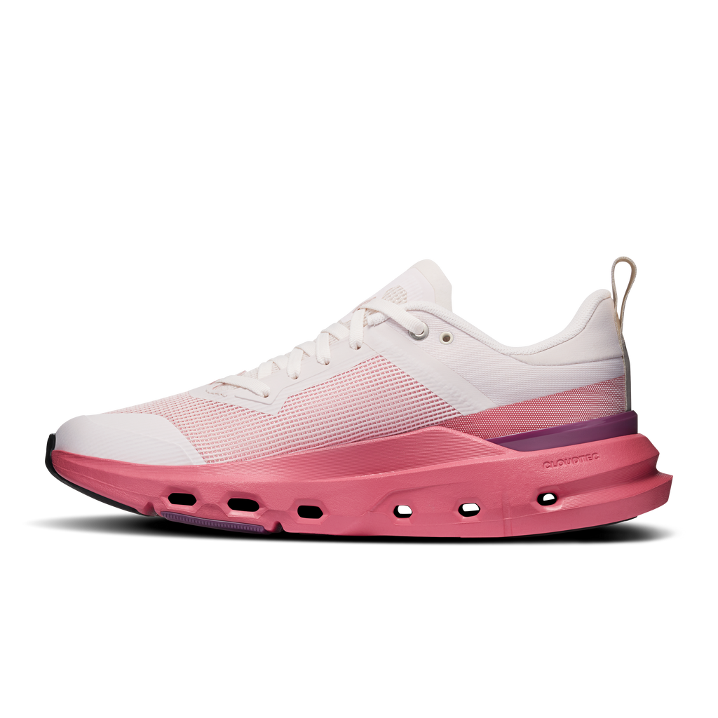 Women's running shoes, white and pink mesh upper with CloudTec midsole.