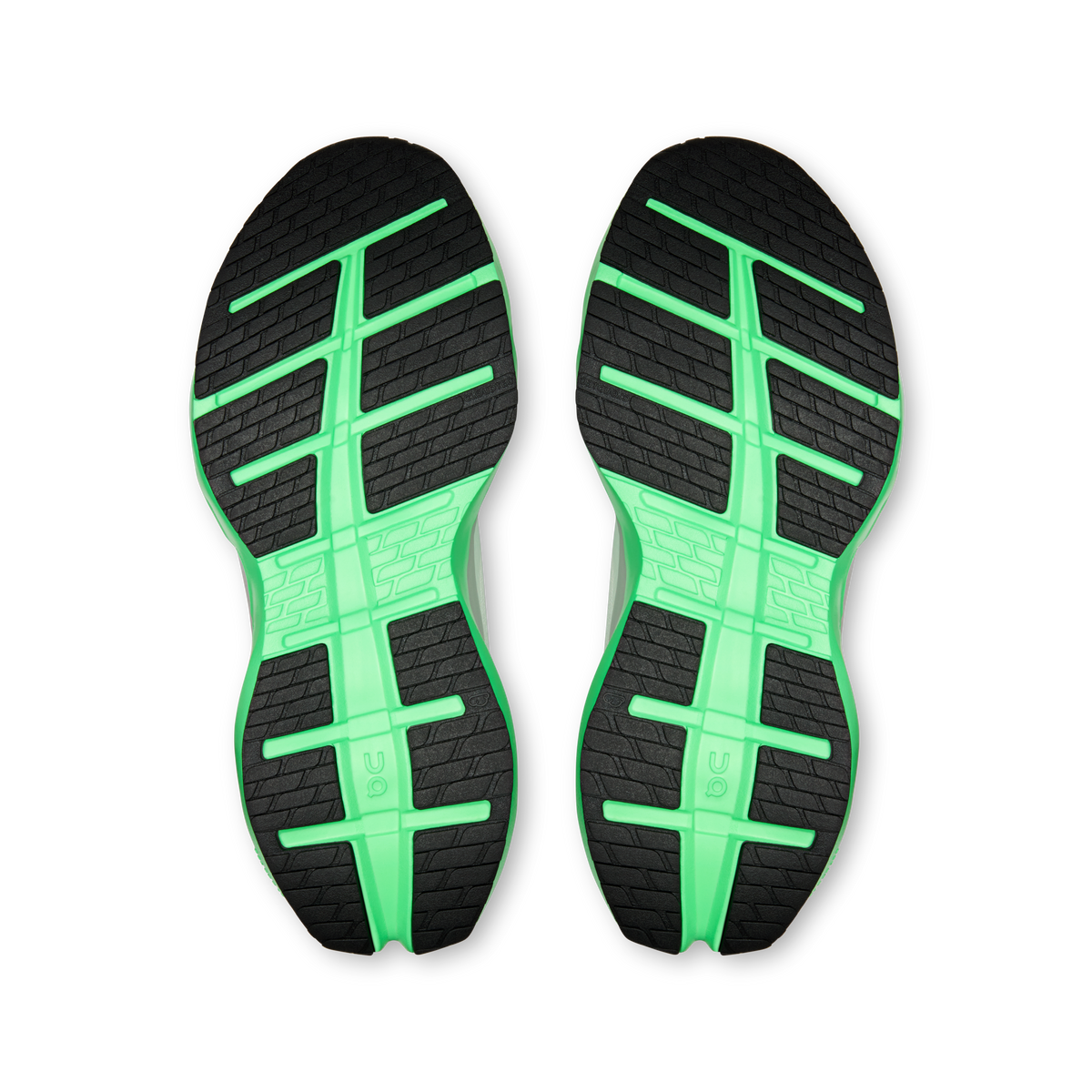 Shoe outsole view: black tread with bright green cross and stripe pattern