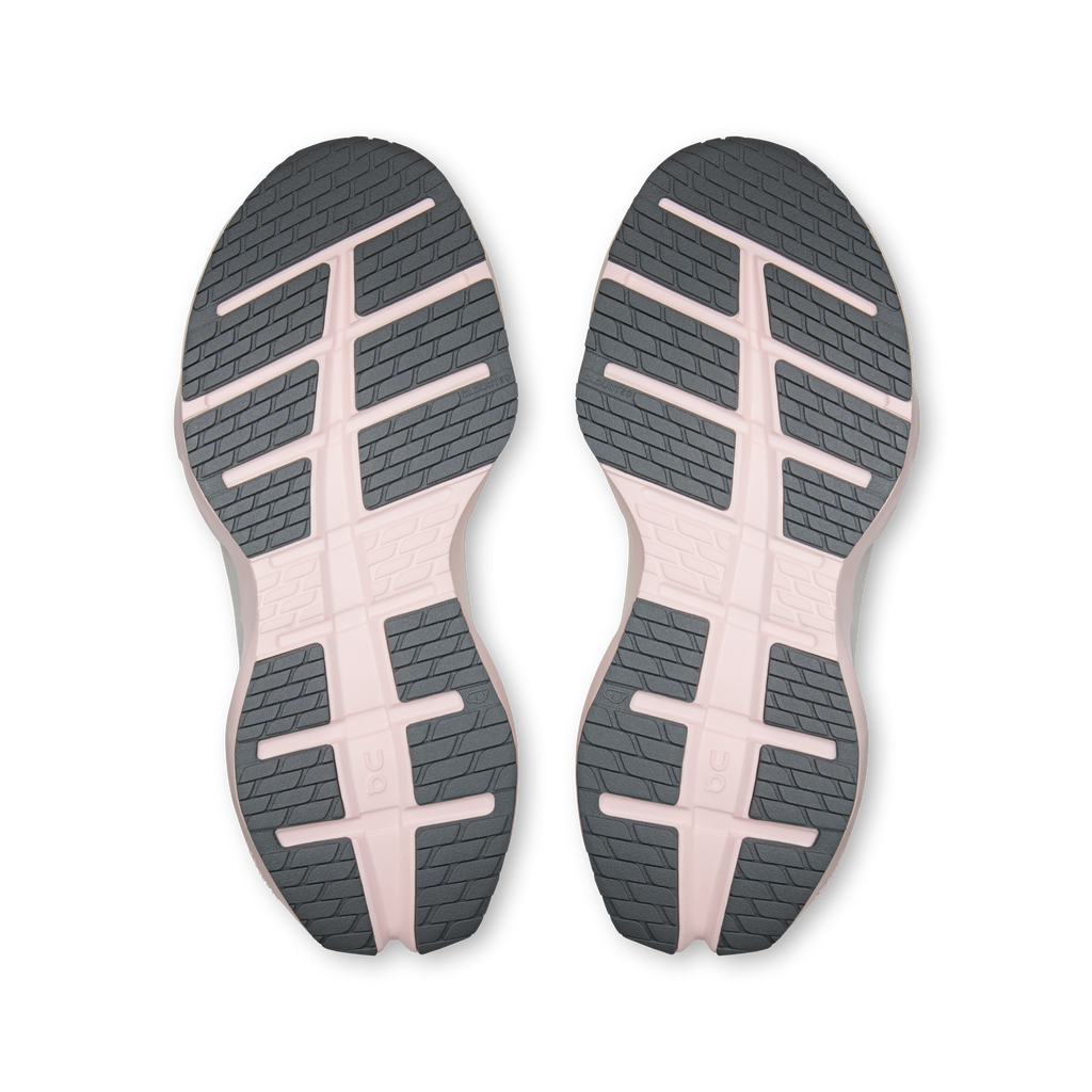 Shoe outsoles with patterned tread and pink and light-gray center sections