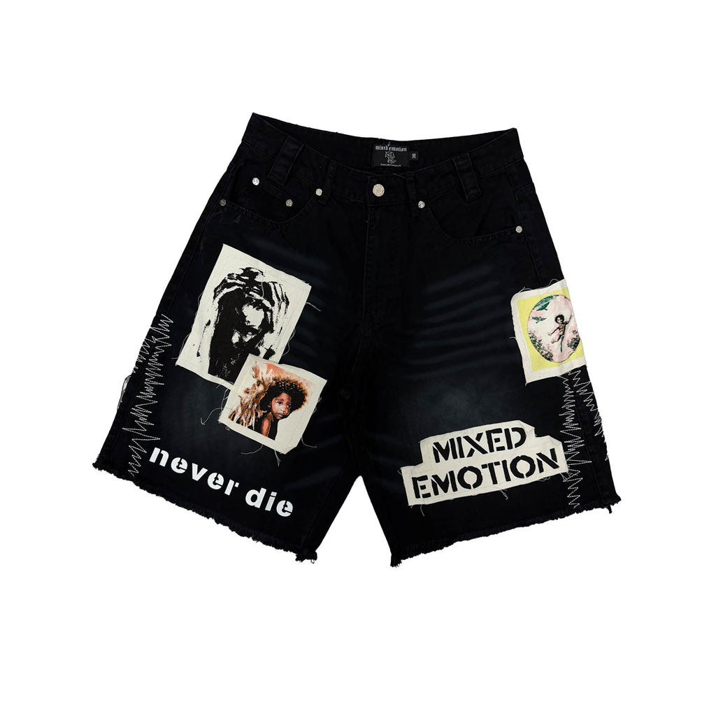 Men's black graphic carpenter shorts with distressed hem and patch prints