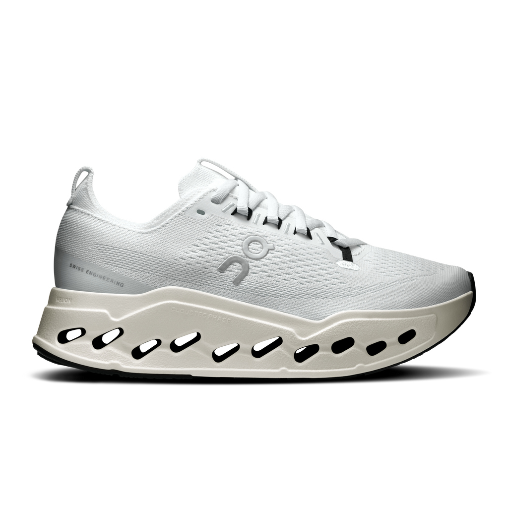 On women’s white running shoes with lace-up front and CloudTec pod sole