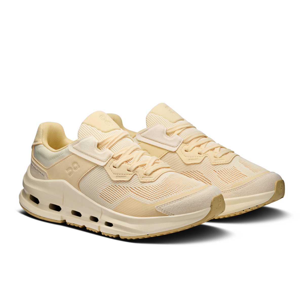 On women's Cloudnova Rift running shoes, side view in light beige with orange stripe