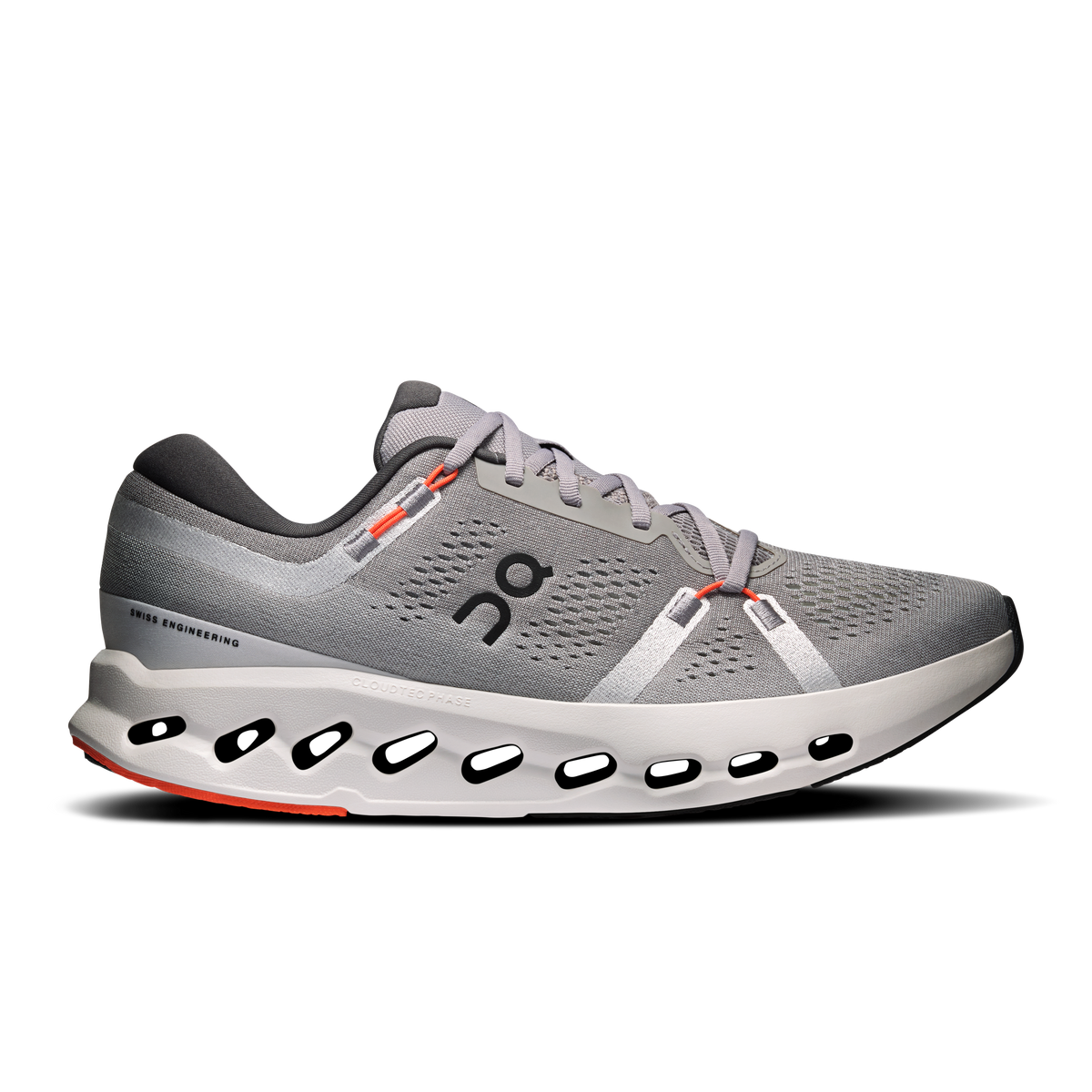 Men's running shoes in gray knit with white sole, lace-up, orange accents.