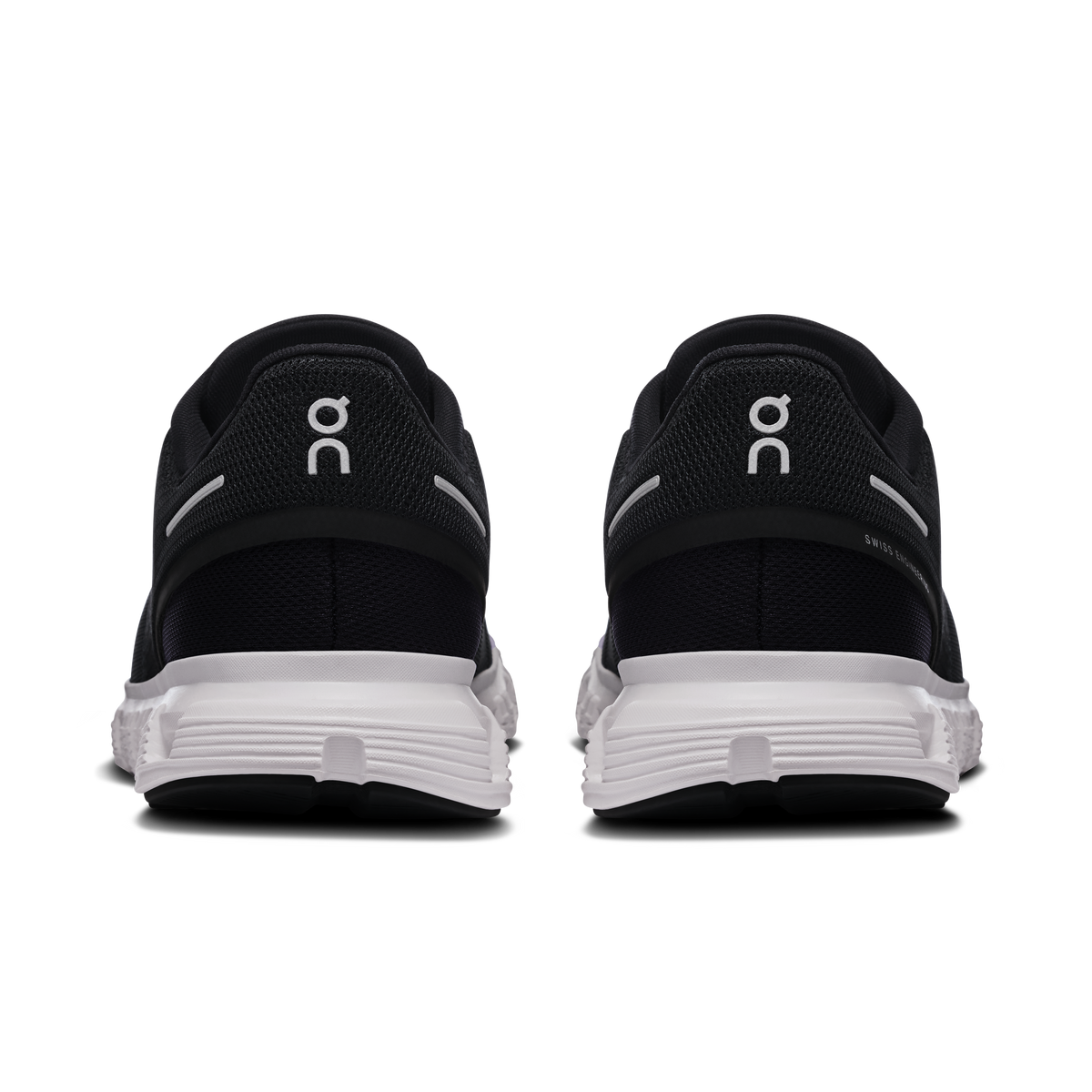 Black women’s running shoes, back view with On branding and white cushioned sole