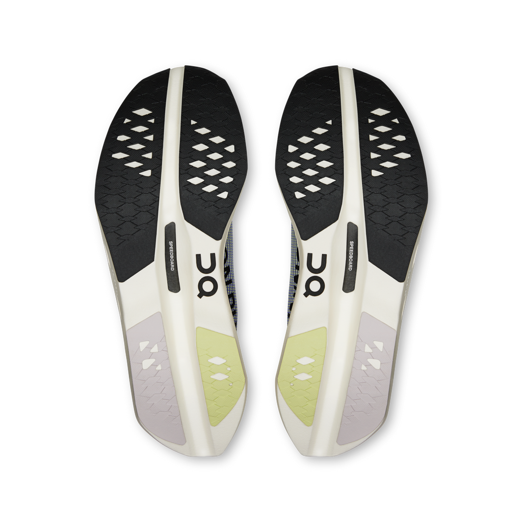 Cloudboom Volt outsoles, black traction pattern with white midsoles and yellow details